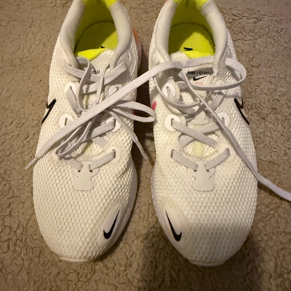 Nike White Athletic Shoes with Black Accents